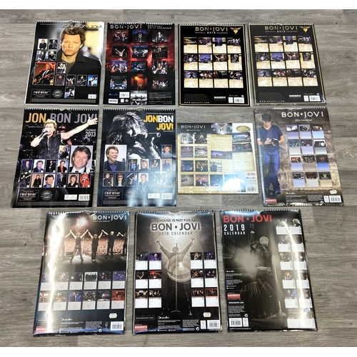 67 - Eleven Bon Jovi calendars from various years, including 2010, 2011, 2012, 2013, 2014, 2016, 2017, 20... 