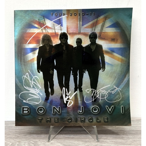 70 - A signed tour programme, Bon Jovi's 'The Circle Tour 2010-2011,' UK variant, features hand-signed au... 