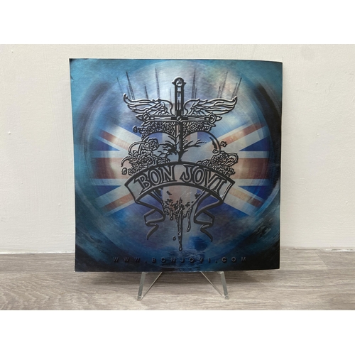 71 - A signed tour programme, Bon Jovi's 'The Circle Tour 2010-2011,' UK variant, features hand-signed au... 
