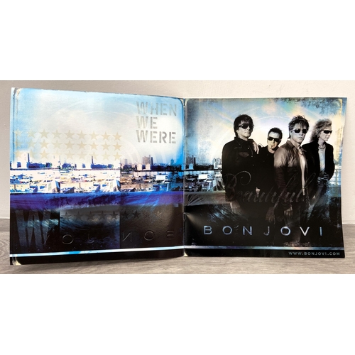 71 - A signed tour programme, Bon Jovi's 'The Circle Tour 2010-2011,' UK variant, features hand-signed au... 