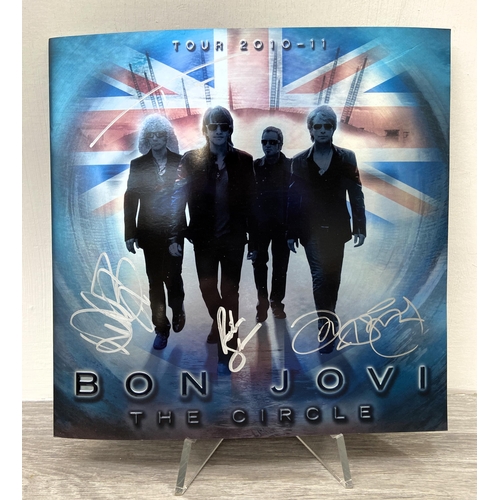 72 - A signed tour programme, Bon Jovi's 'The Circle Tour 2010-2011,' UK variant, features hand-signed au... 