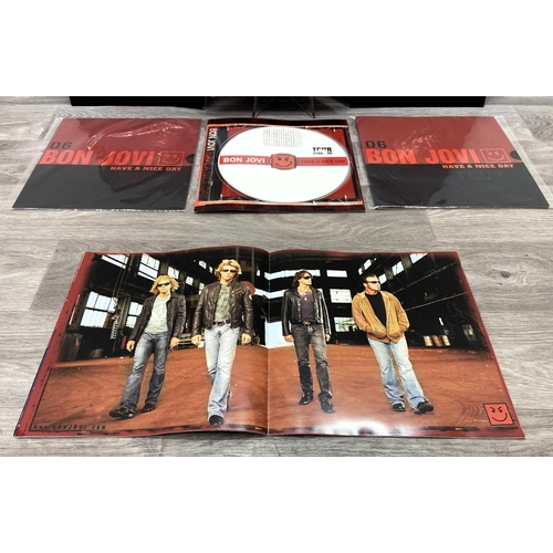 78 - Seven tour programmes for Bon Jovi's 'Have A Nice Day Tour 2005-2006,' two variants