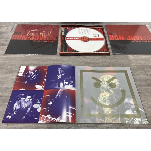 78 - Seven tour programmes for Bon Jovi's 'Have A Nice Day Tour 2005-2006,' two variants