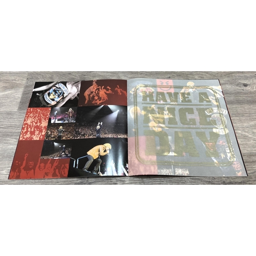 78 - Seven tour programmes for Bon Jovi's 'Have A Nice Day Tour 2005-2006,' two variants