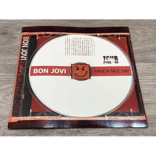 78 - Seven tour programmes for Bon Jovi's 'Have A Nice Day Tour 2005-2006,' two variants