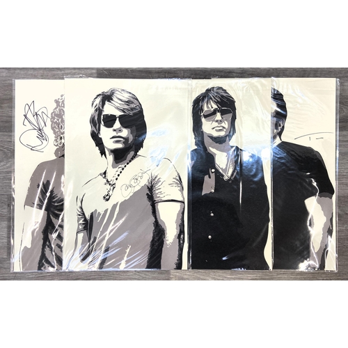 81 - A set of four limited edition autographed Bon Jovi lithographs featuring band members Jon Bon Jovi, ... 