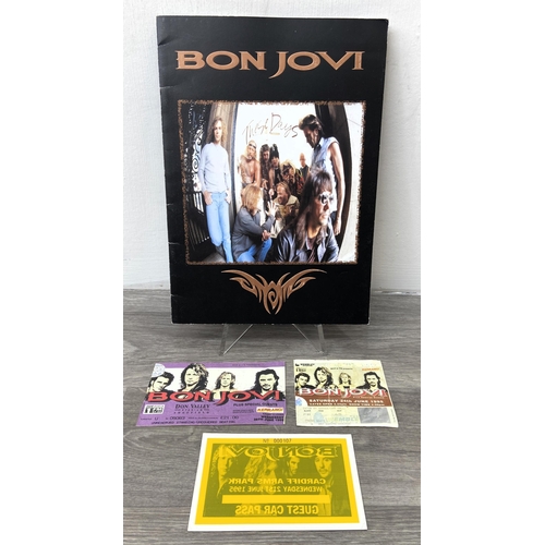 84 - Four items from Bon Jovi's 'These Days Tour': one 1995 UK tour programme featuring 24 pages of conce... 