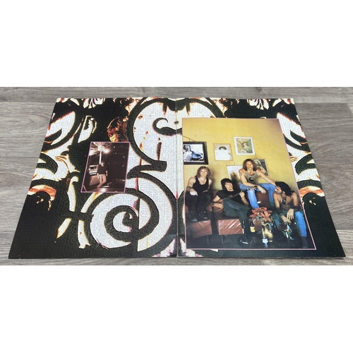 84 - Four items from Bon Jovi's 'These Days Tour': one 1995 UK tour programme featuring 24 pages of conce... 