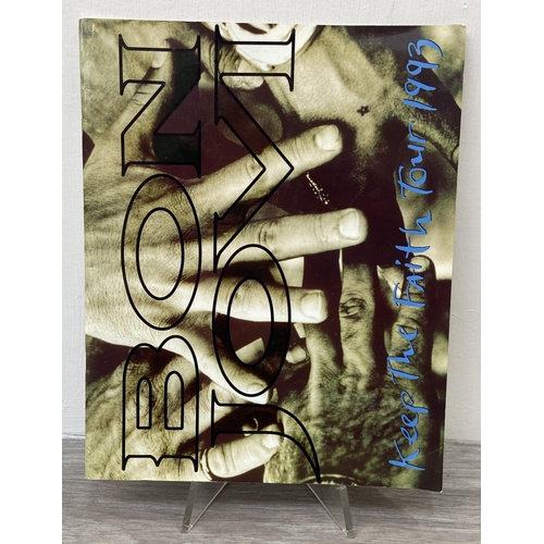 85 - An official Bon Jovi 'Keep The Faith' 1993 UK tour programme together with a laminated tour staff pa... 