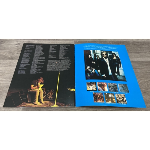 85 - An official Bon Jovi 'Keep The Faith' 1993 UK tour programme together with a laminated tour staff pa... 