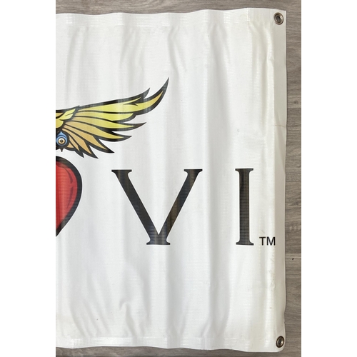 9 - Two double-sided vinyl promotional banners, possibly used during Bon Jovi's 'The Circle Tour,' one b... 