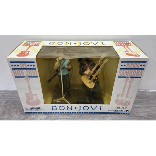 92 - A Bon Jovi two-pack collectible action figure set by McFarlane Toys, released in 2007, features Jon ... 