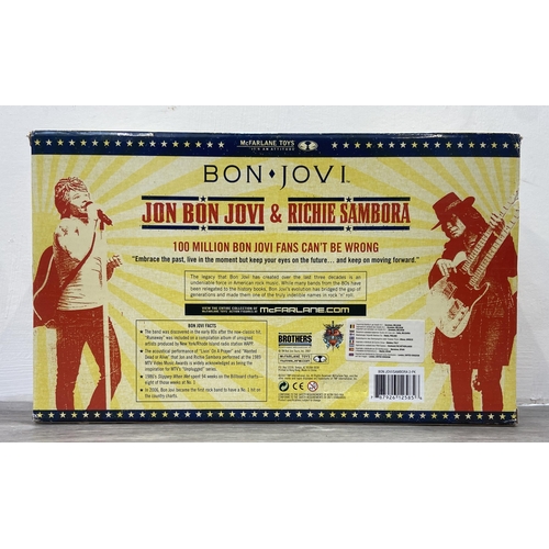 92 - A Bon Jovi two-pack collectible action figure set by McFarlane Toys, released in 2007, features Jon ... 
