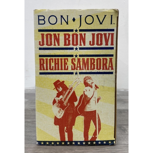 92 - A Bon Jovi two-pack collectible action figure set by McFarlane Toys, released in 2007, features Jon ... 