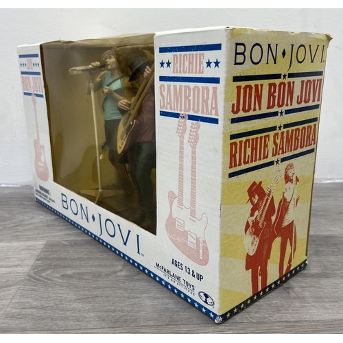 92 - A Bon Jovi two-pack collectible action figure set by McFarlane Toys, released in 2007, features Jon ... 