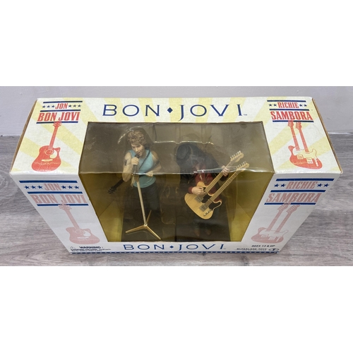 92 - A Bon Jovi two-pack collectible action figure set by McFarlane Toys, released in 2007, features Jon ... 