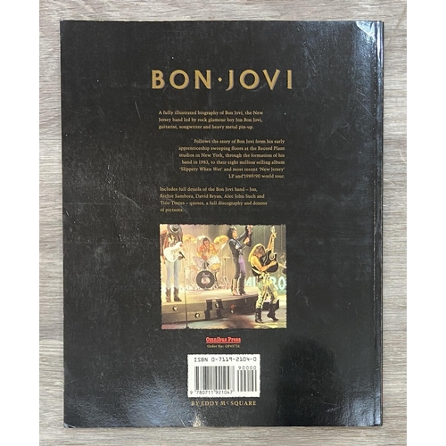 94 - Four books and one comic to include Rock 'N' Roll Comics #3 'Bon Jovi,' published by Revolutionary C... 