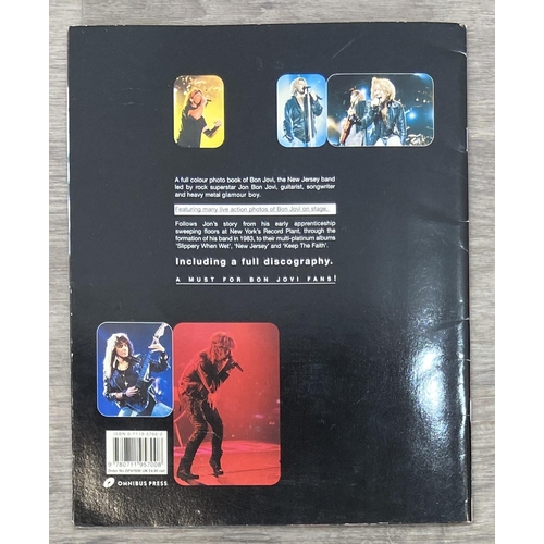 94 - Four books and one comic to include Rock 'N' Roll Comics #3 'Bon Jovi,' published by Revolutionary C... 
