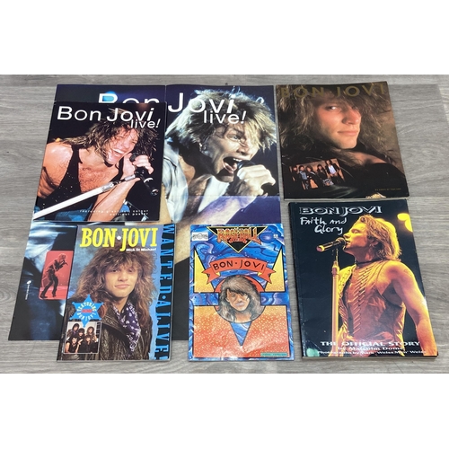 94 - Four books and one comic to include Rock 'N' Roll Comics #3 'Bon Jovi,' published by Revolutionary C... 