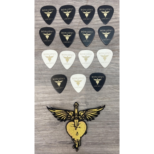96 - A collection of memorabilia from the Bon Jovi Live Tour 2011 (Greatest Hits), to include a VIP lamin... 