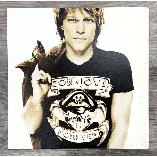 96 - A collection of memorabilia from the Bon Jovi Live Tour 2011 (Greatest Hits), to include a VIP lamin... 