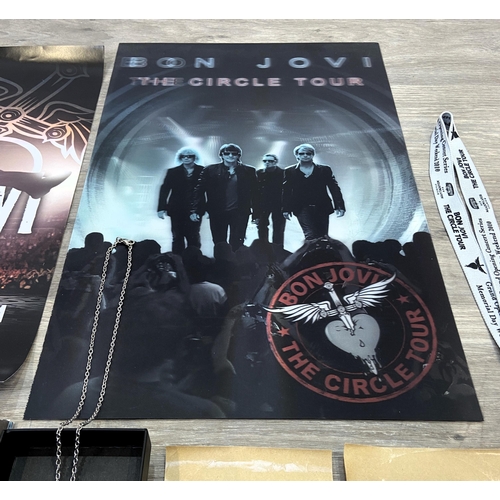 98 - Thirteen items of memorabilia from Bon Jovi's The Circle Tour 2010-2011, to include a limited editio... 