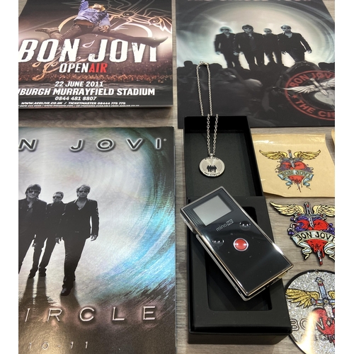 98 - Thirteen items of memorabilia from Bon Jovi's The Circle Tour 2010-2011, to include a limited editio... 