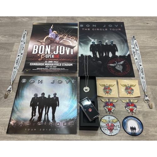 98 - Thirteen items of memorabilia from Bon Jovi's The Circle Tour 2010-2011, to include a limited editio... 
