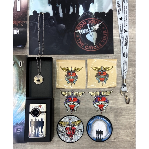 98 - Thirteen items of memorabilia from Bon Jovi's The Circle Tour 2010-2011, to include a limited editio... 