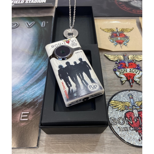 98 - Thirteen items of memorabilia from Bon Jovi's The Circle Tour 2010-2011, to include a limited editio... 