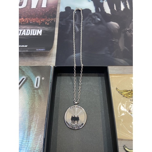 98 - Thirteen items of memorabilia from Bon Jovi's The Circle Tour 2010-2011, to include a limited editio... 