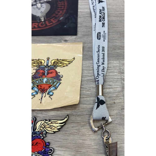 98 - Thirteen items of memorabilia from Bon Jovi's The Circle Tour 2010-2011, to include a limited editio... 