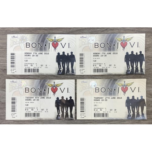 99 - An official tour programme and four tickets from Bon Jovi's 'The Circle Tour 2010-2011.' The tickets... 
