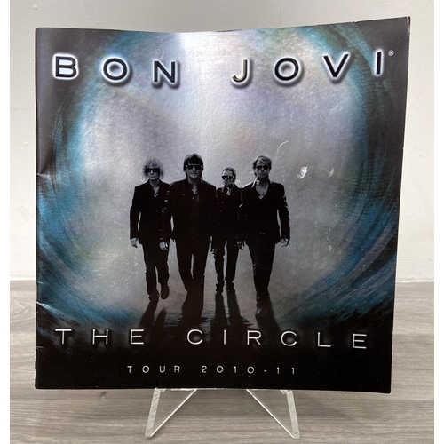 99 - An official tour programme and four tickets from Bon Jovi's 'The Circle Tour 2010-2011.' The tickets... 
