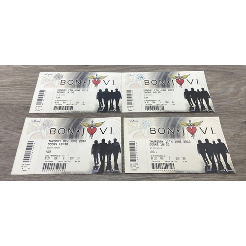 99 - An official tour programme and four tickets from Bon Jovi's 'The Circle Tour 2010-2011.' The tickets... 
