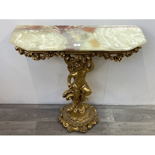 A mid/late 20th century Rococo style gilt wood and onyx console table ...