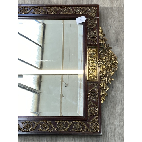 288 - A Georgian style mahogany and parcel gilt framed bevelled edge wall mirror - approx. 100cm high x 58... 