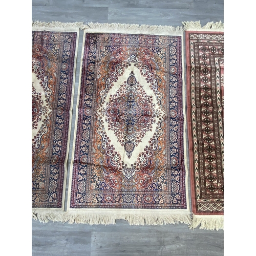 Three Belgian made Herat spun rayon rugs - approx. 115cm x 67cm
