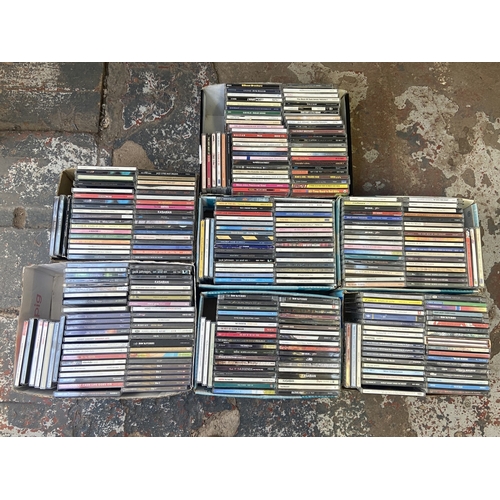 633 - Seven boxes containing approx. three hundred CDs to include Kaiser Chiefs, Keane, Kasabian, Razorlig... 