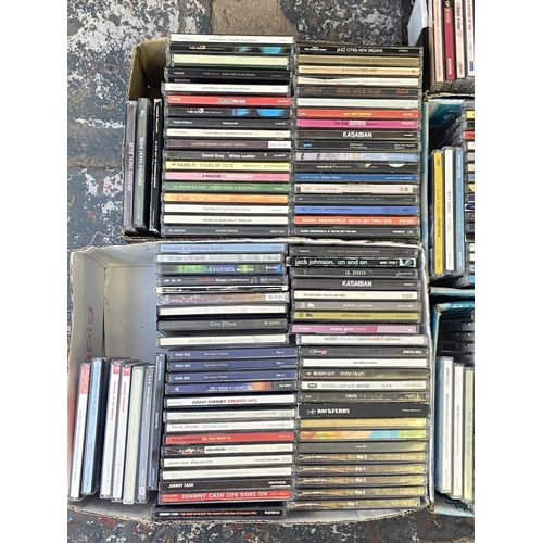 633 - Seven boxes containing approx. three hundred CDs to include Kaiser Chiefs, Keane, Kasabian, Razorlig... 