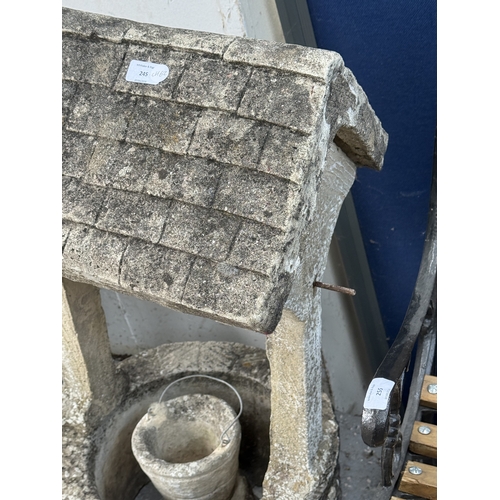 A cast stone wishing well garden ornament - approx. 83cm high x 54cm ...