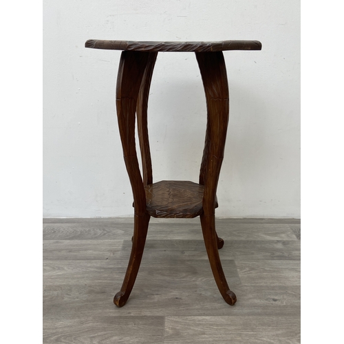An Arts & Crafts Liberty & Co. Japanese carved hardwood octagonal two ...