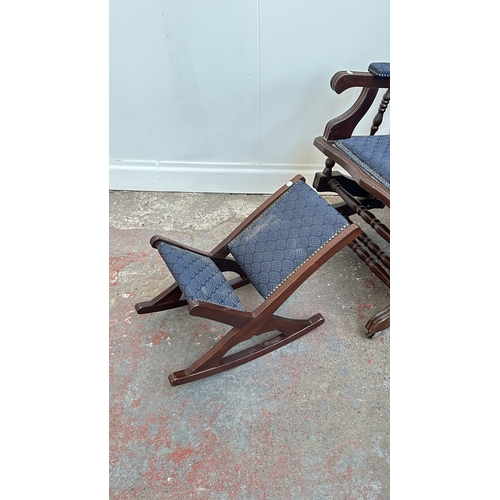 142 - Two pieces of mid/late 20th century mahogany and blue fabric upholstered furniture, one gout stool a... 