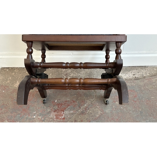 142 - Two pieces of mid/late 20th century mahogany and blue fabric upholstered furniture, one gout stool a... 