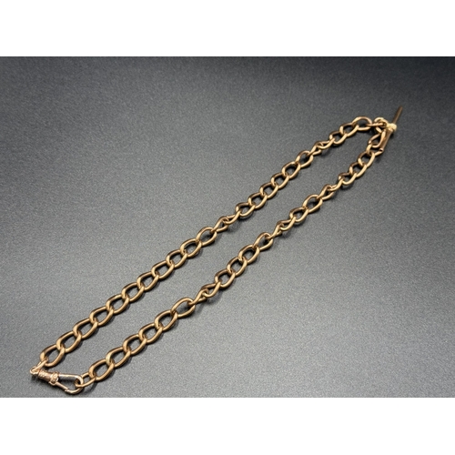 A late 19th/early 20th century hallmarked 9ct gold Albert chain with 9ct gold T-bar and 9ct gold clasp - approx. gross weight 39.48g and approx. 43cm long