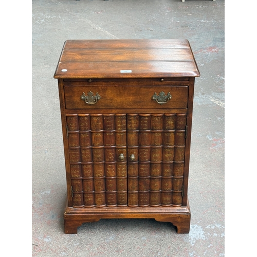 103 - A Theodore Alexander mahogany faux book front side cabinet - approx. 70cm high x 51cm wide x 37cm de... 