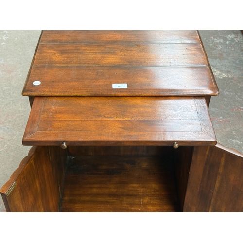 103 - A Theodore Alexander mahogany faux book front side cabinet - approx. 70cm high x 51cm wide x 37cm de... 