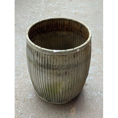 111 - A vintage galvanised dolly tub - approx. 52cm high x 44cm diameter