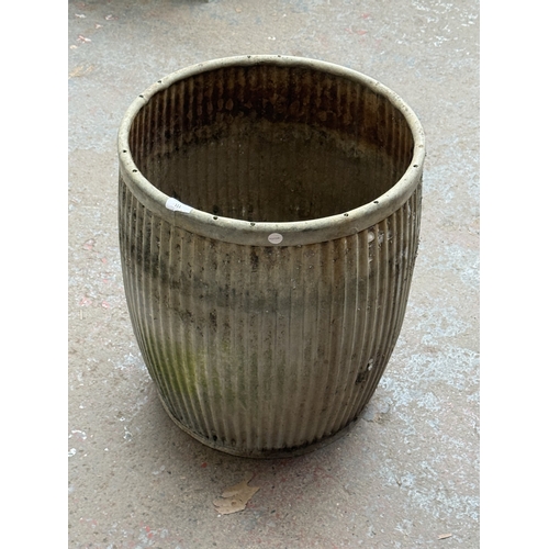 111 - A vintage galvanised dolly tub - approx. 52cm high x 44cm diameter