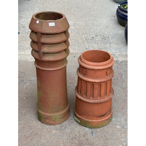 119 - Two terracotta chimney pots - approx. largest 91cm high